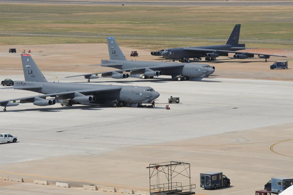 Three B-52H Stratofortress bombers parked on the flight line at Barksdale Air Force Base, Louisiana