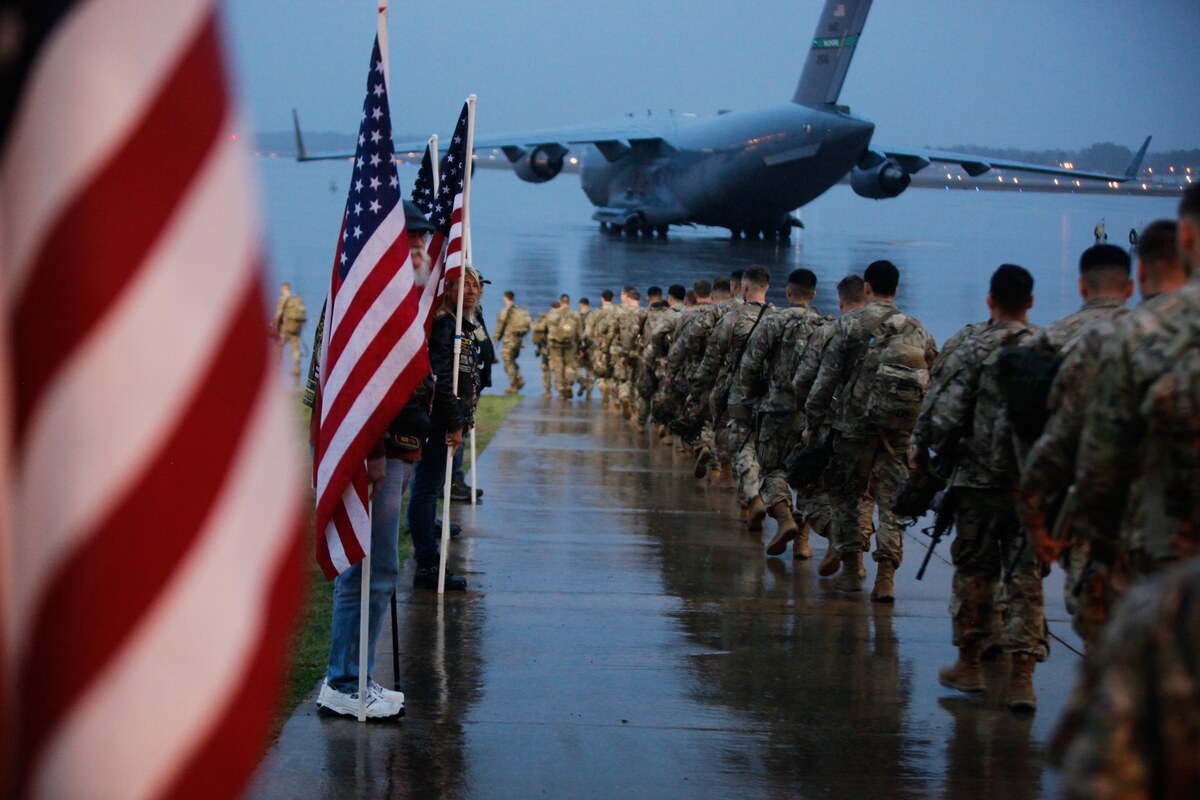 82nd Airborne soldiers boarding an Air Force C-17 on the Pope Army Airfield flight line at Fort Liberty