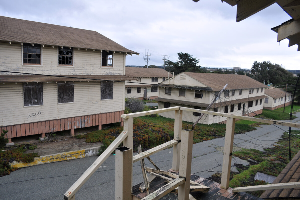 Boarded-up abandoned wooden barracks at the closed Fort Ord in Monterey County, California