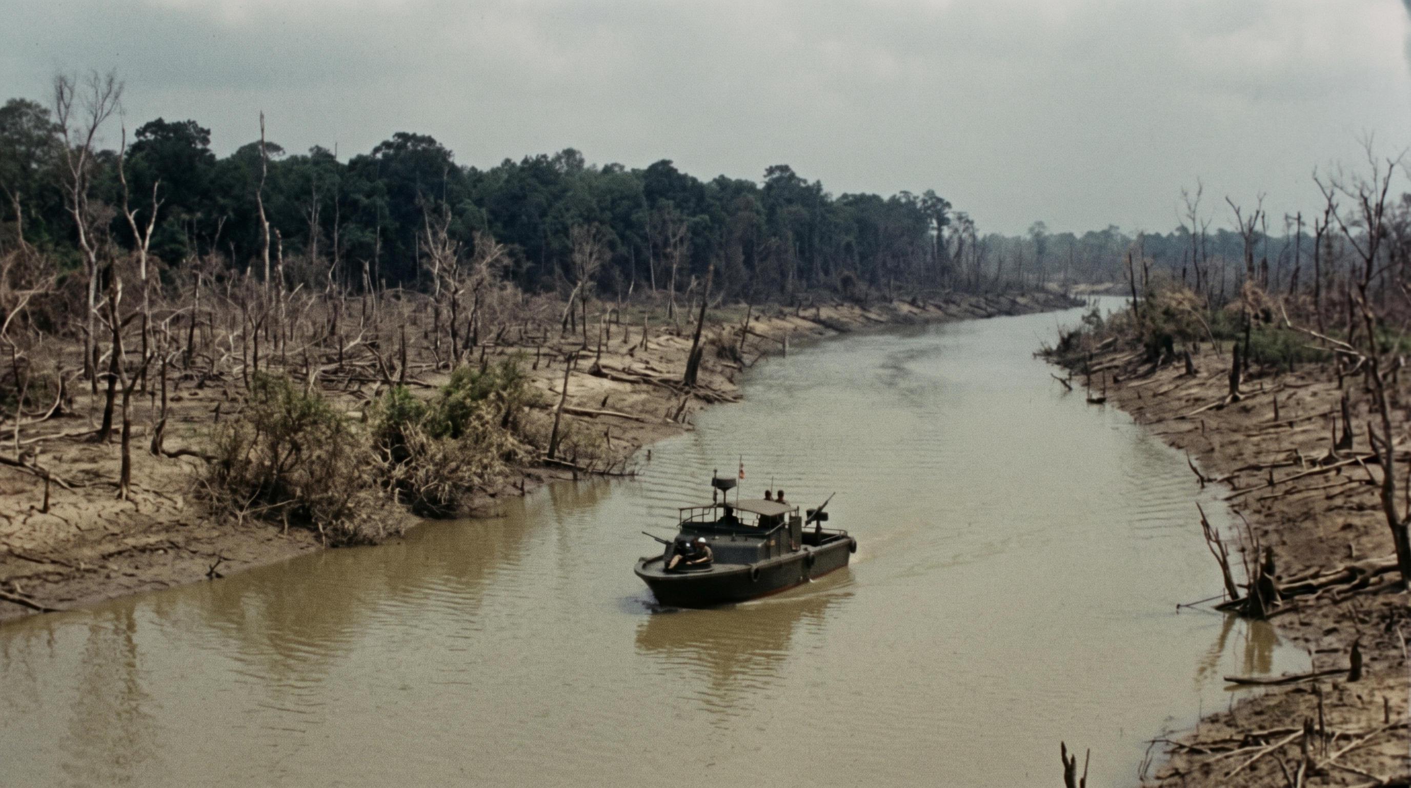 A Vietnam-era river patrol boat moving up a narrow Mekong Delta waterway between defoliated, stripped-bare riverbanks